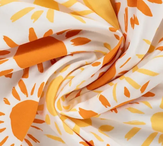 Tricot wit met zonnetjes  - Qjutie & the Qjutest